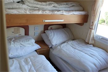 Photo of the twin bedroom in a second hand Delta Denbigh 2007 mobile home for sale in Brean, Somerset, South West England